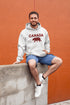 Meet the Plaid & Proud Hoodie, featuring a rugged red & black plaid bear alongside "Canada" in matching plaid lettering—because nothing says “True North strong” like a bear rocking Canadian flannel.